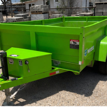 Bulk Feed Jet TrailersBright green utility trailer parked in a sunny yard with construction materials. The trailer features a sturdy build and a bold color, suggesting utility and durability.